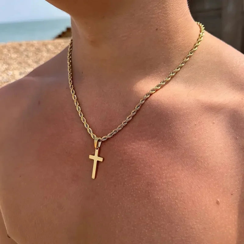 Guldfärgat halsband med kors